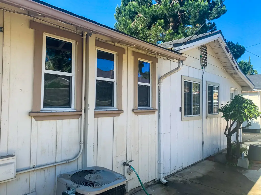 Before exterior house painting San Gabriel weathered wood siding windows trim contractors needed