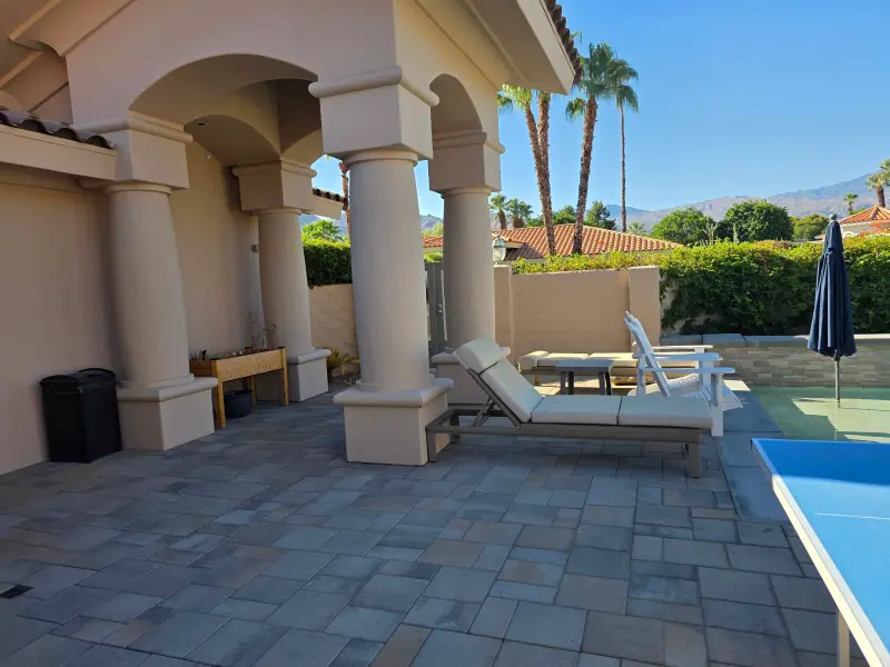 Newly painted patio columns and exterior walls creating a modern, refreshed outdoor space at a residential property in Indian Wells, CA 92210.